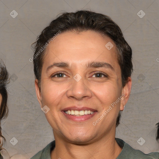 Joyful white adult female with medium  brown hair and brown eyes