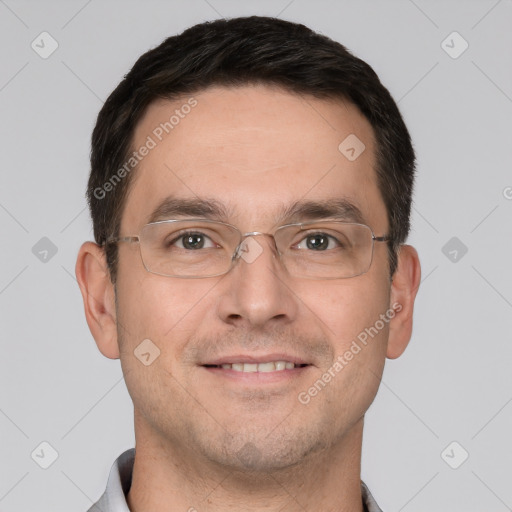 Joyful white adult male with short  brown hair and brown eyes