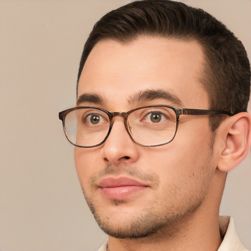 Joyful white young-adult male with short  brown hair and brown eyes