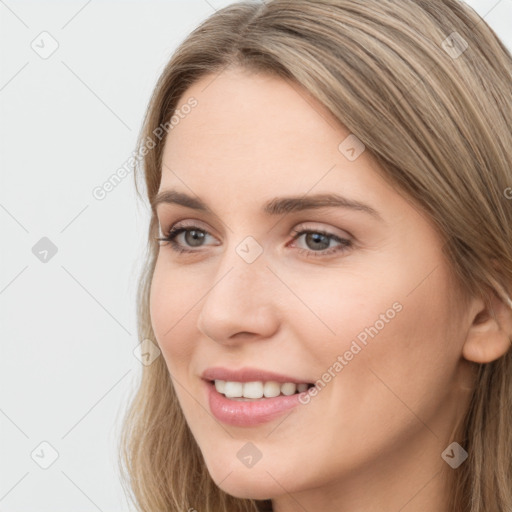 Joyful white young-adult female with long  brown hair and grey eyes