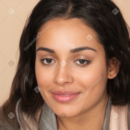 Joyful latino young-adult female with long  brown hair and brown eyes