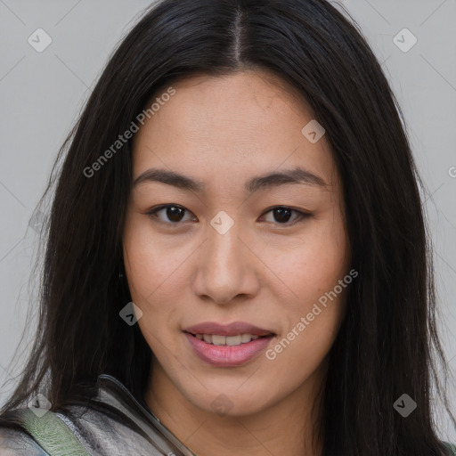 Joyful asian young-adult female with long  brown hair and brown eyes