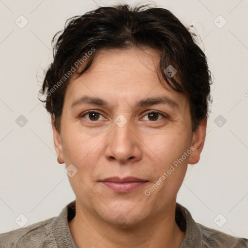 Joyful white adult female with short  brown hair and brown eyes