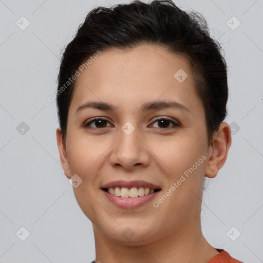 Joyful white young-adult female with short  brown hair and brown eyes