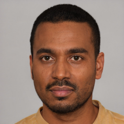 Neutral black young-adult male with short  black hair and brown eyes