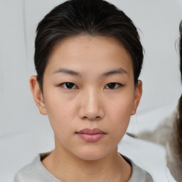 Neutral white young-adult female with short  brown hair and brown eyes