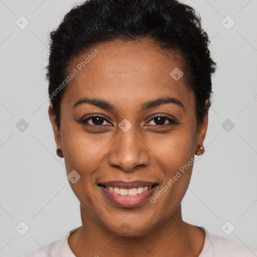 Joyful latino young-adult female with short  black hair and brown eyes