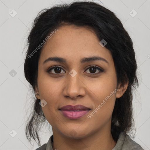 Joyful latino young-adult female with medium  brown hair and brown eyes