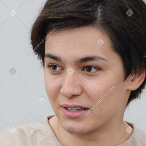 Joyful white young-adult female with short  brown hair and brown eyes