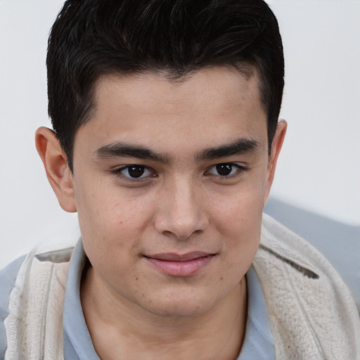 Joyful asian young-adult male with short  brown hair and brown eyes
