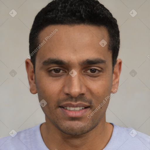 Joyful white young-adult male with short  black hair and brown eyes