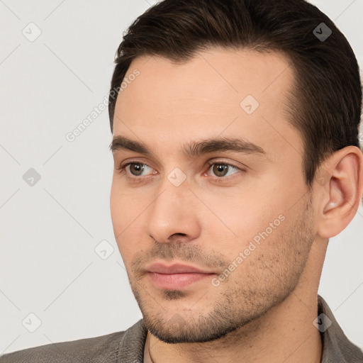 Neutral white young-adult male with short  brown hair and brown eyes