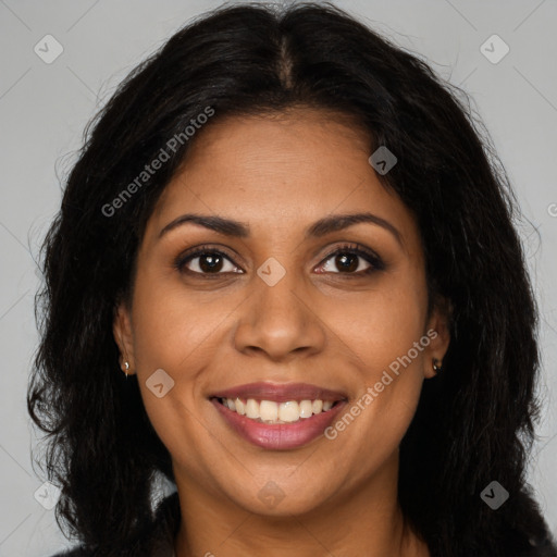 Joyful latino young-adult female with long  brown hair and brown eyes