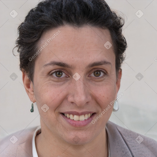 Joyful white adult female with short  brown hair and brown eyes