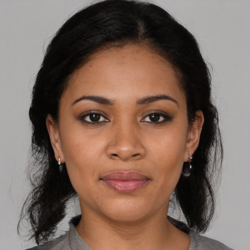 Joyful asian young-adult female with medium  black hair and brown eyes
