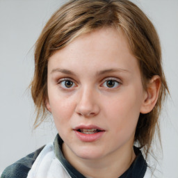 Neutral white young-adult female with medium  brown hair and blue eyes