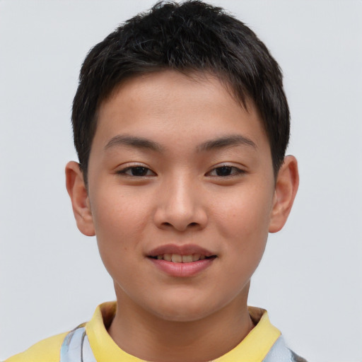 Joyful asian child female with short  brown hair and brown eyes