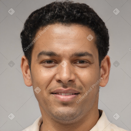 Joyful latino young-adult male with short  brown hair and brown eyes