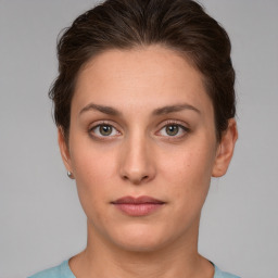 Neutral white young-adult female with short  brown hair and brown eyes