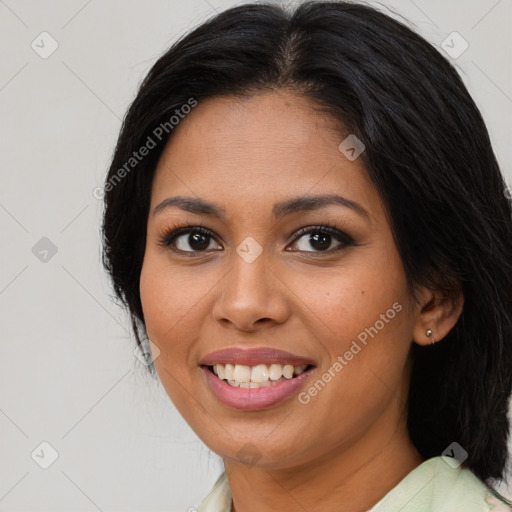 Joyful latino young-adult female with medium  brown hair and brown eyes