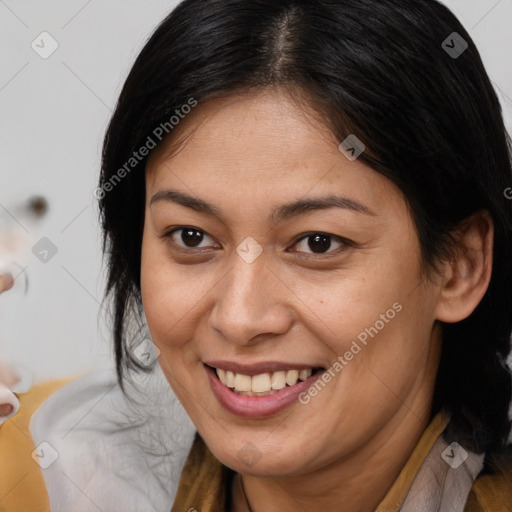 Joyful white adult female with medium  brown hair and brown eyes