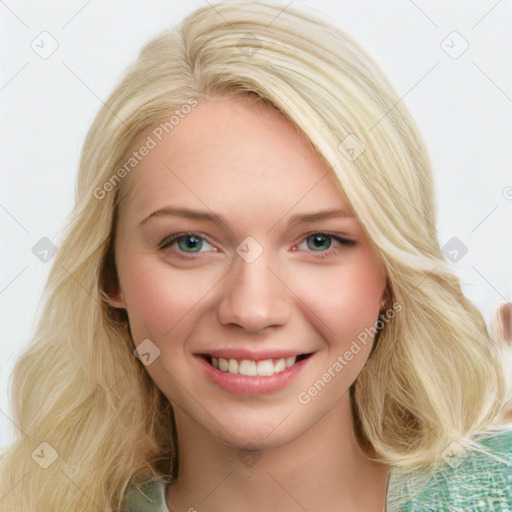 Joyful white young-adult female with long  brown hair and blue eyes