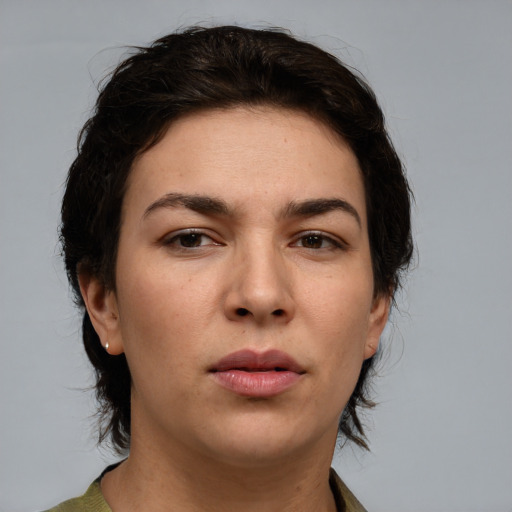 Neutral white young-adult female with medium  brown hair and brown eyes