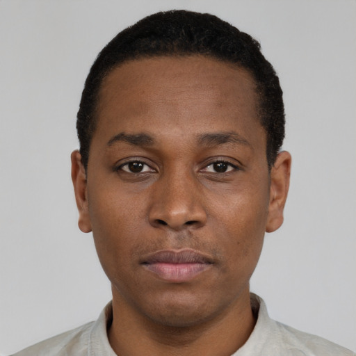 Neutral black young-adult male with short  black hair and brown eyes