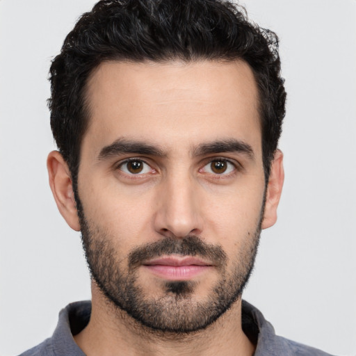 Neutral white young-adult male with short  black hair and brown eyes