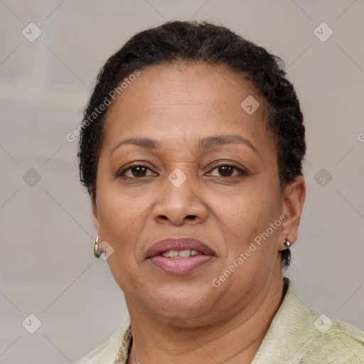 Joyful latino adult female with short  brown hair and brown eyes