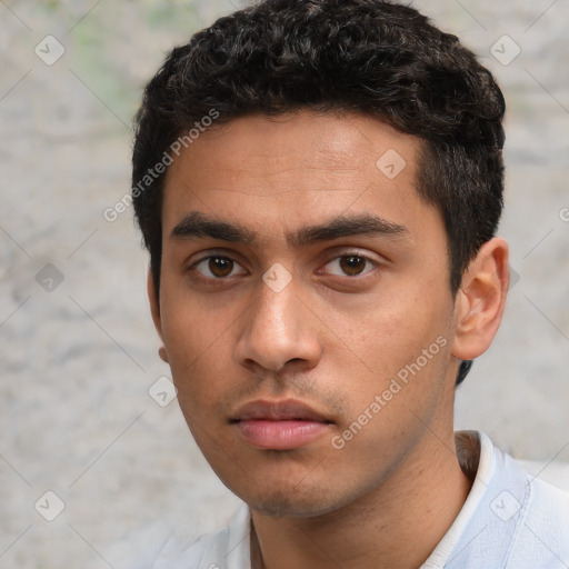 Neutral white young-adult male with short  black hair and brown eyes