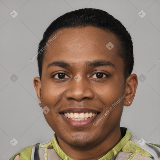 Joyful black young-adult male with short  black hair and brown eyes