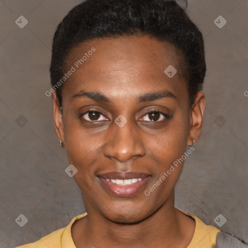 Joyful black young-adult female with short  black hair and brown eyes