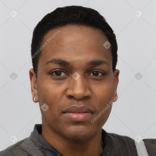 Joyful black young-adult male with short  black hair and brown eyes