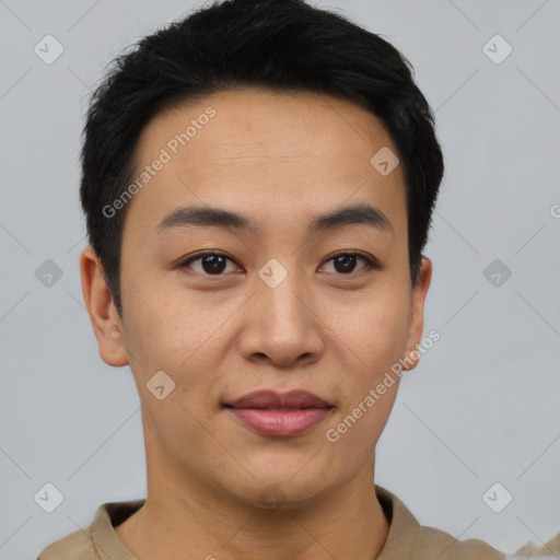 Joyful asian young-adult male with short  black hair and brown eyes