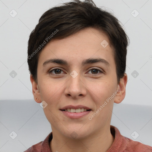 Joyful white young-adult female with short  brown hair and grey eyes