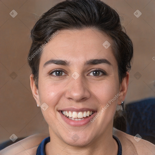 Joyful white young-adult female with short  brown hair and brown eyes