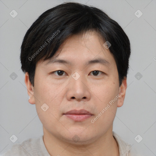 Neutral asian young-adult male with short  brown hair and brown eyes