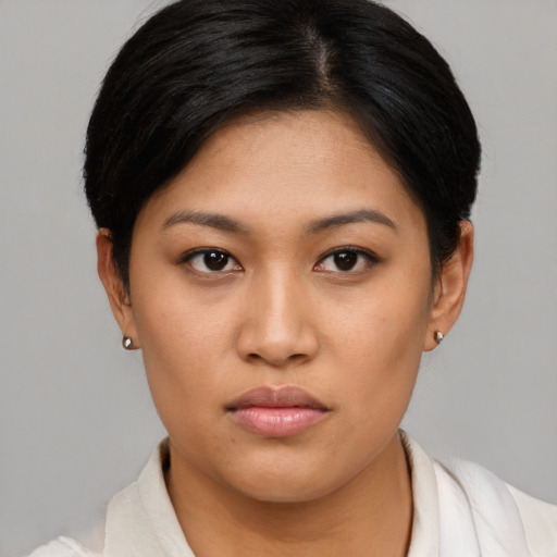 Neutral asian young-adult female with short  brown hair and brown eyes