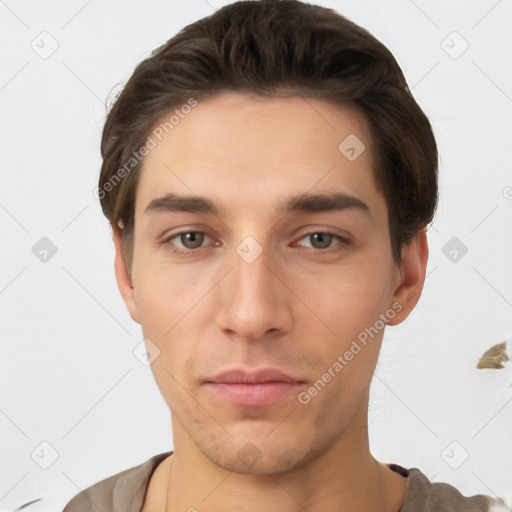 Neutral white young-adult male with short  brown hair and brown eyes