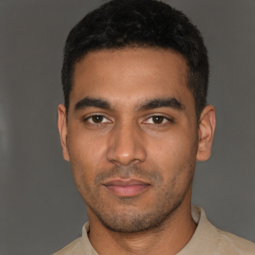 Neutral latino young-adult male with short  black hair and brown eyes