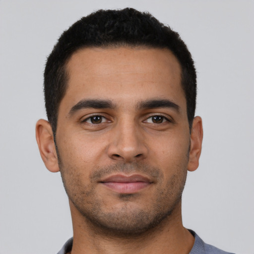Neutral latino young-adult male with short  brown hair and brown eyes