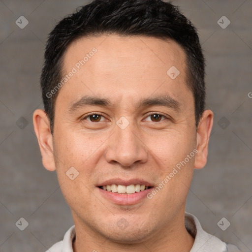 Joyful white adult male with short  brown hair and brown eyes