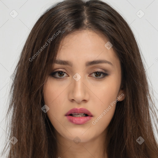 Neutral white young-adult female with long  brown hair and brown eyes