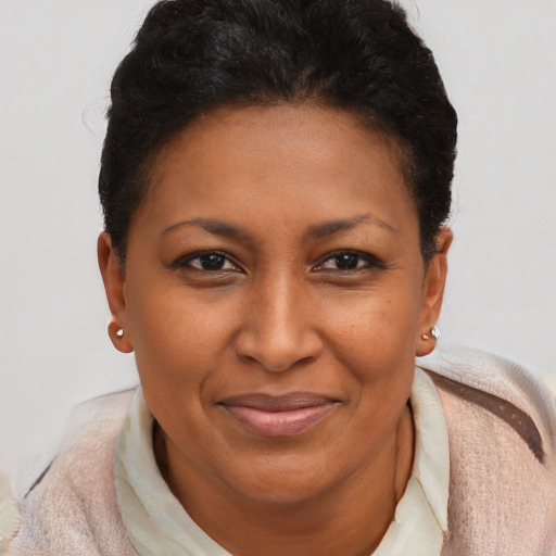 Joyful asian adult female with short  brown hair and brown eyes