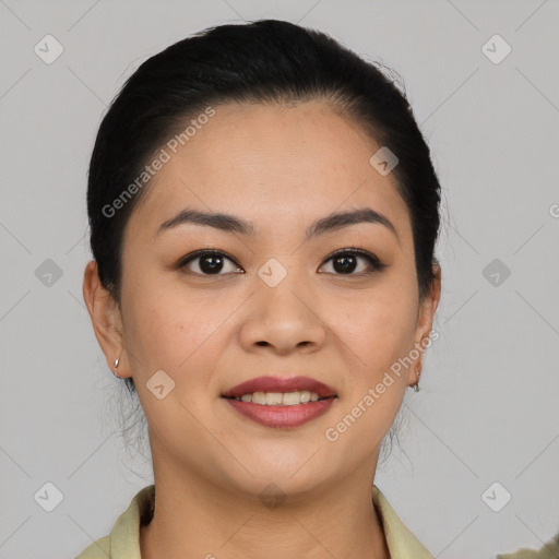 Joyful asian young-adult female with medium  brown hair and brown eyes