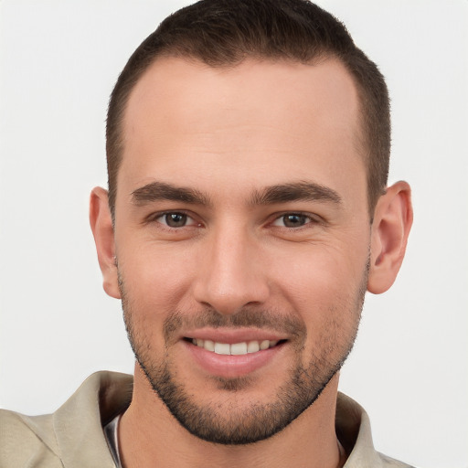 Joyful white young-adult male with short  brown hair and brown eyes