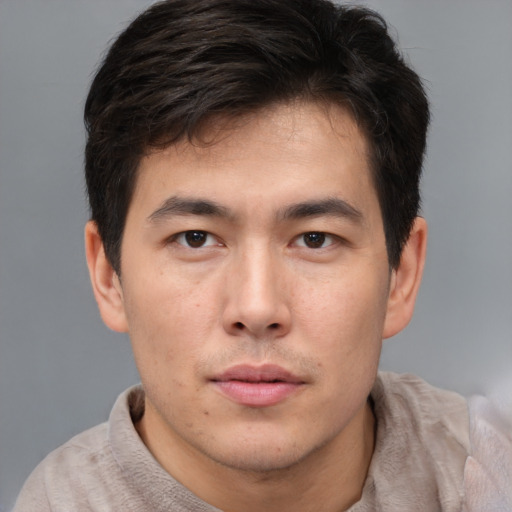Neutral asian young-adult male with short  brown hair and brown eyes