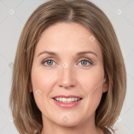 Joyful white young-adult female with medium  brown hair and green eyes