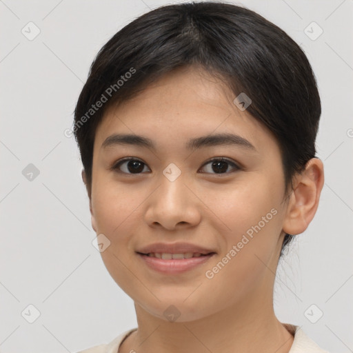 Joyful latino young-adult female with short  brown hair and brown eyes